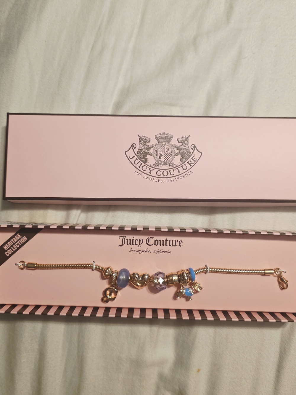 Juicy Couture Heritage Collection Gold Charm Bracelet with Blue Accents